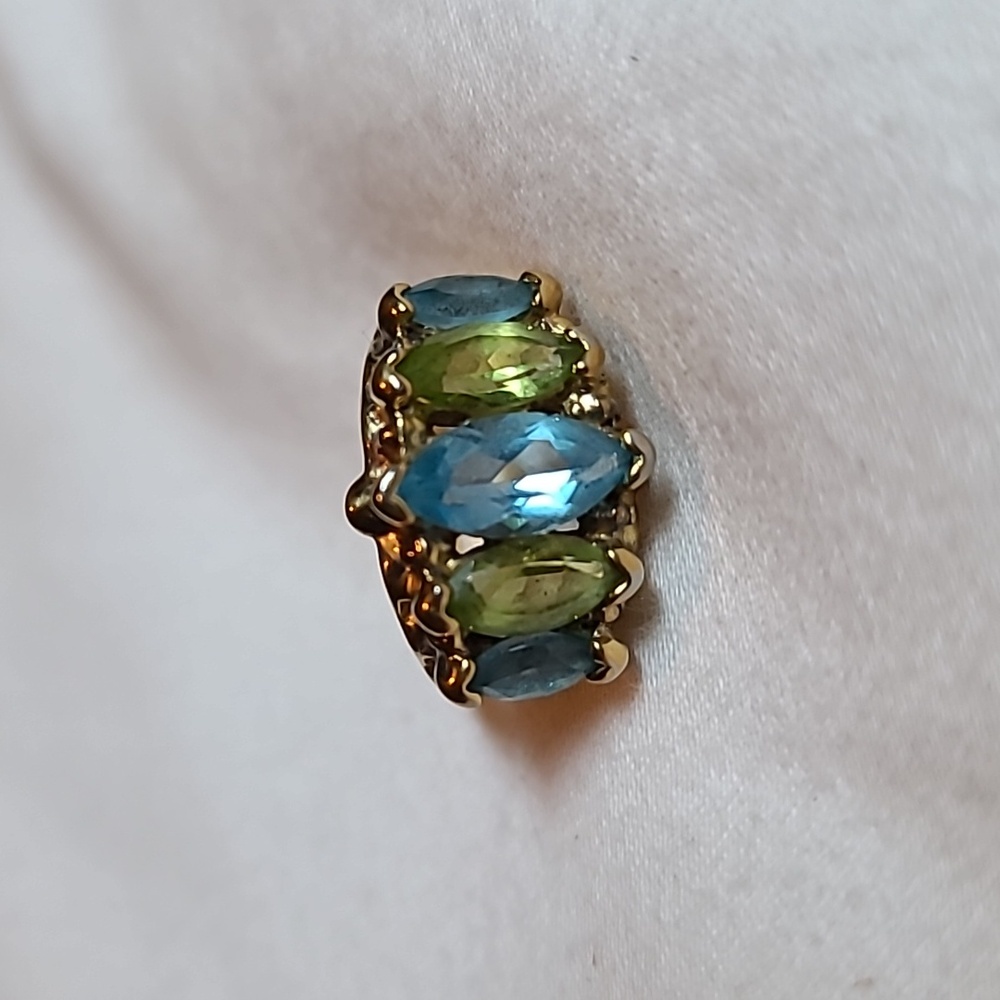 Silver with gold plating genuine blue topaz and peridot ring size 4.75